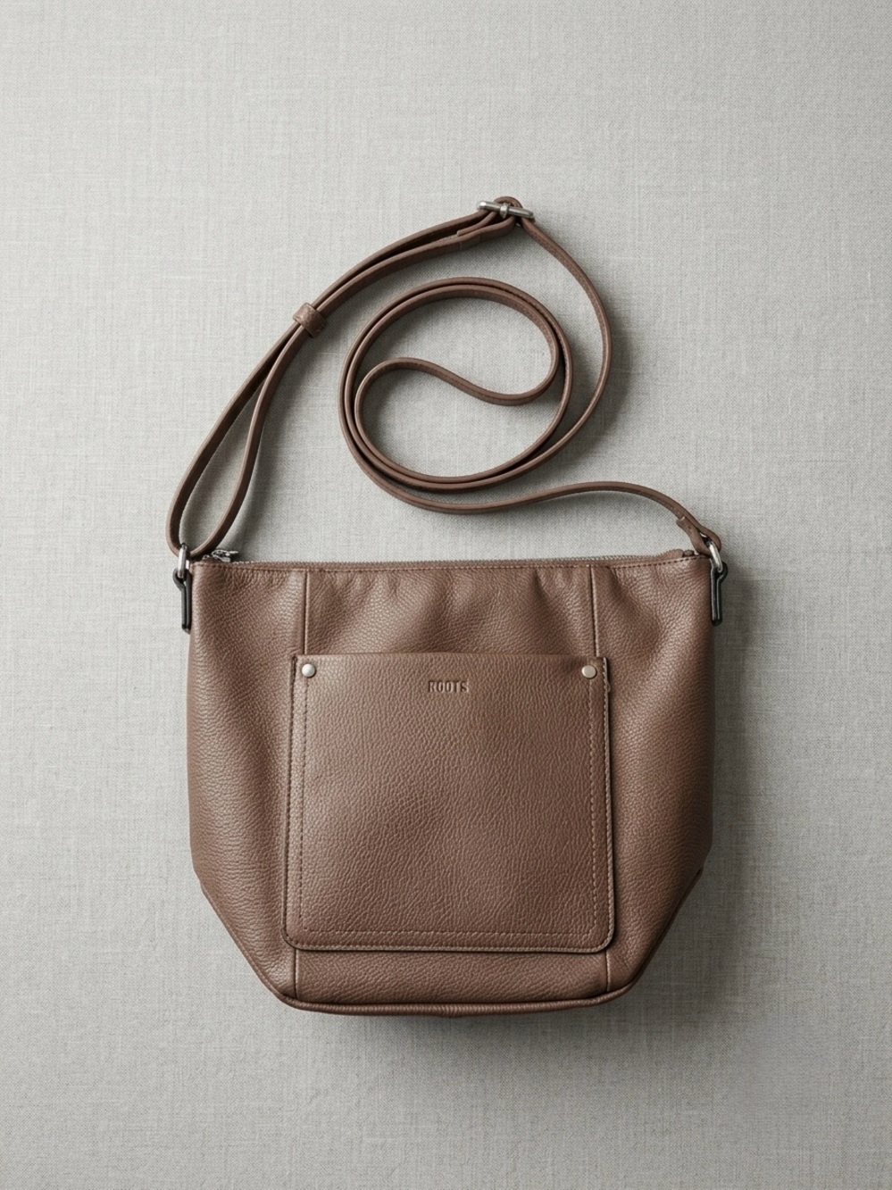 Roots Pebbled Faux Leather Crossbody in Chestnut Brown